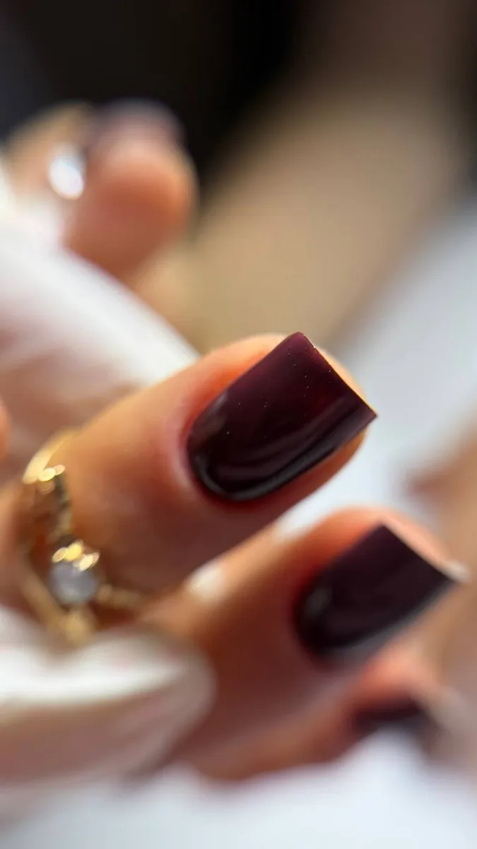 Burgundy nails, close-up